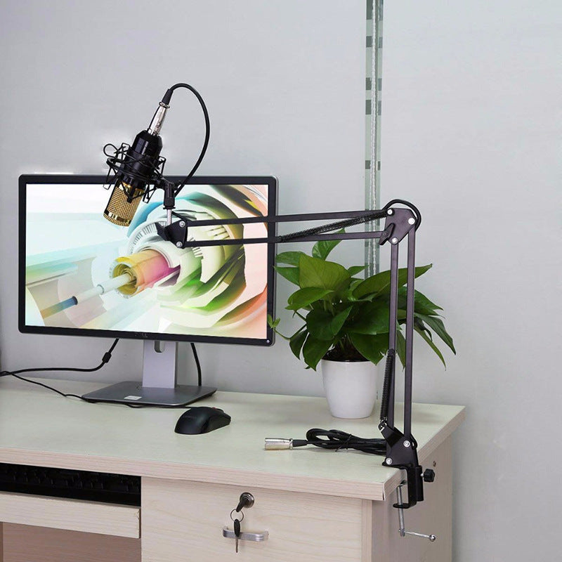 Net Microphone Stand Set for gaming, streaming, and podcasting on a compact desk setup.