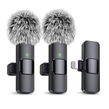 Wireless lavalier microphone system with dual clip-on mics and receiver, ideal for outdoor use.