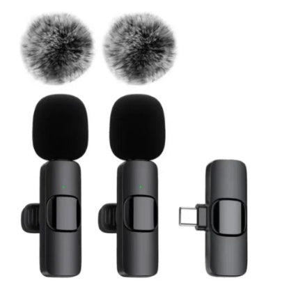 Wireless Lavalier Microphone system with dual clip-on mics and charging case.